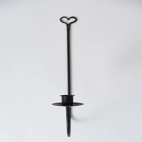 Black metal candle holder with heart