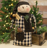 Decorative snowman doll with checkered shirt and plaid with rusty tin bell and star
